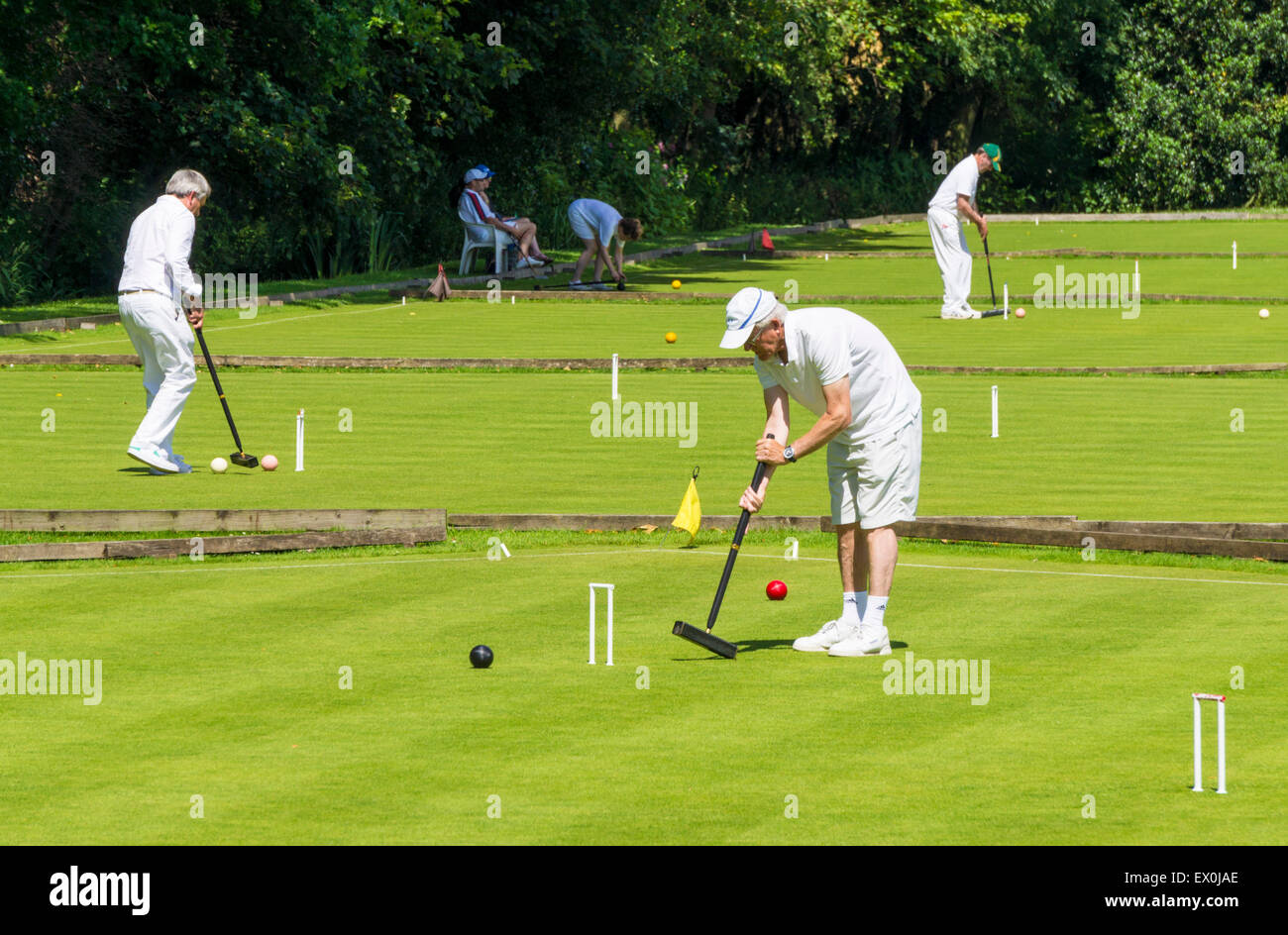 Croquet giocando al Parco Highfields Nottingham Nottinghamshire England Regno Unito GB EU Europe Foto Stock