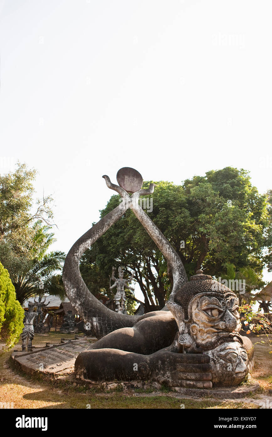 Statue in cemento in Xieng Khuan (Buddha Park), Vientiane, Laos P.D.R. Buddha Park è stato creato da Luang Pou Bounlua Soulilat. Egli Foto Stock