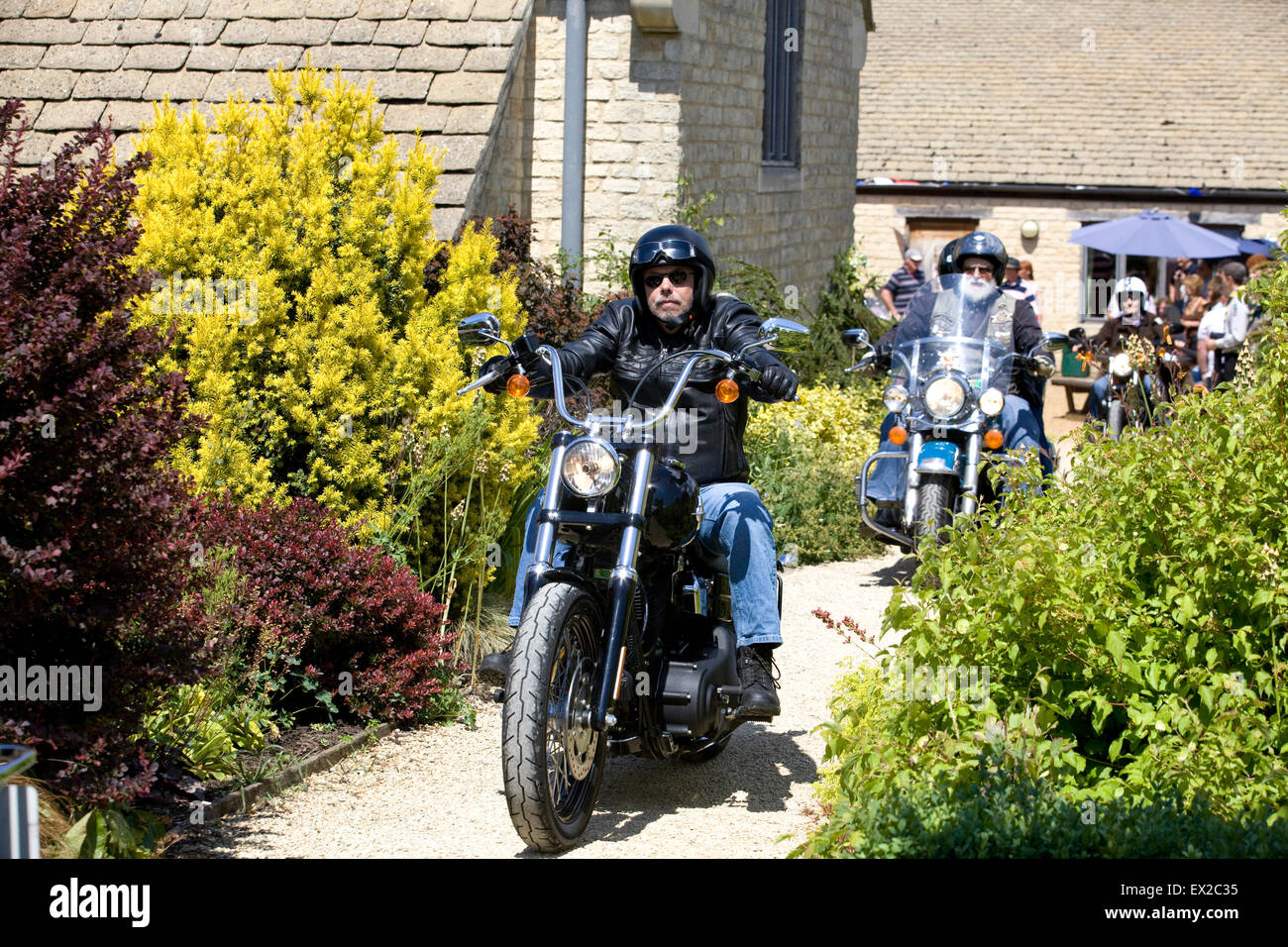Motociclisti di Harley Davidson il motociclo su un percorso Foto Stock
