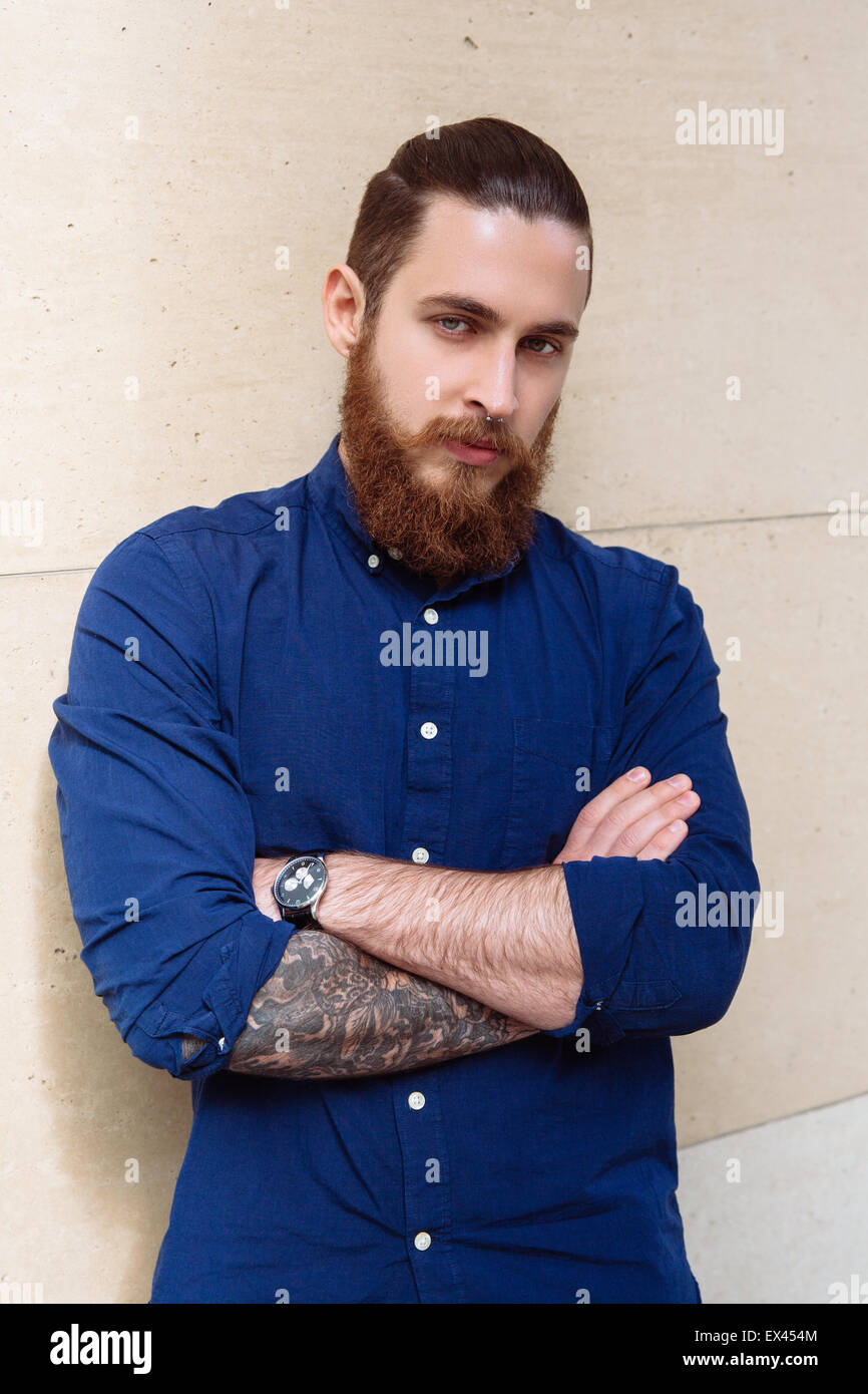 Tanga barbuto in città Foto Stock