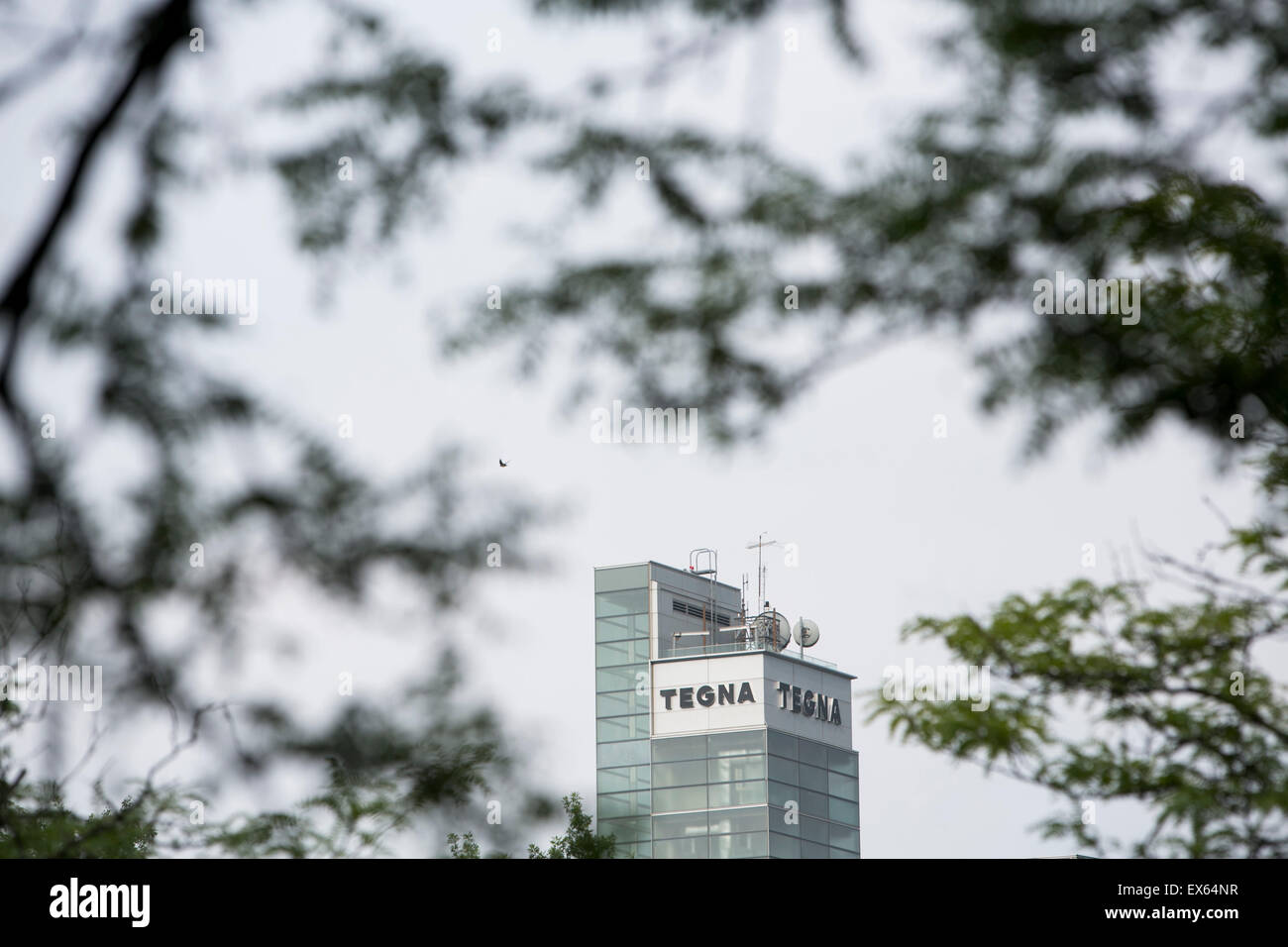 Un logo segno al di fuori della sede congiunta di Gannett e il recente formato TEGNA, presso Tysons Corner, Virginia. Foto Stock