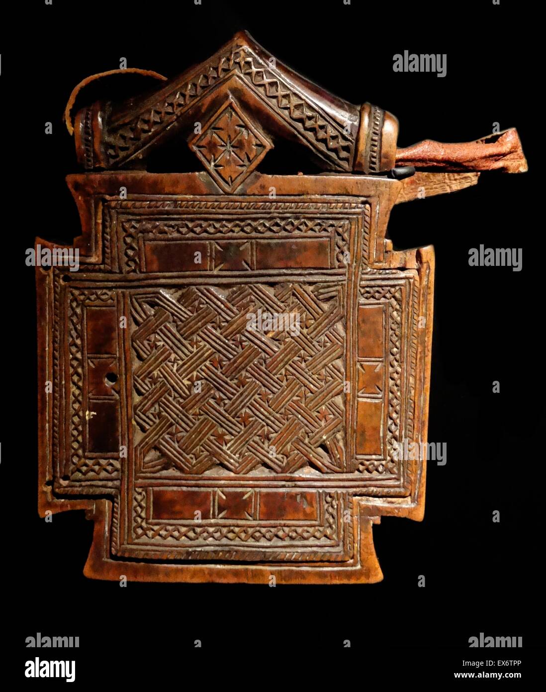 Icona del telecomando. Dall'Etiopia, realizzato in legno e cuoio e pigmenti. Foto Stock