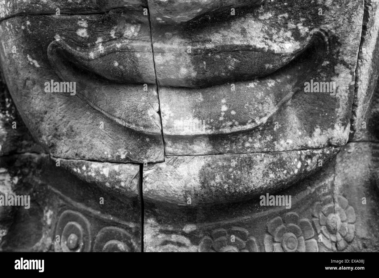 Asia, Cambogia Siem Reap, Close-up di pietra scolpite le labbra del XII secolo il Re Buddista Jayavarman VII al tempio Bayon a Ang Foto Stock
