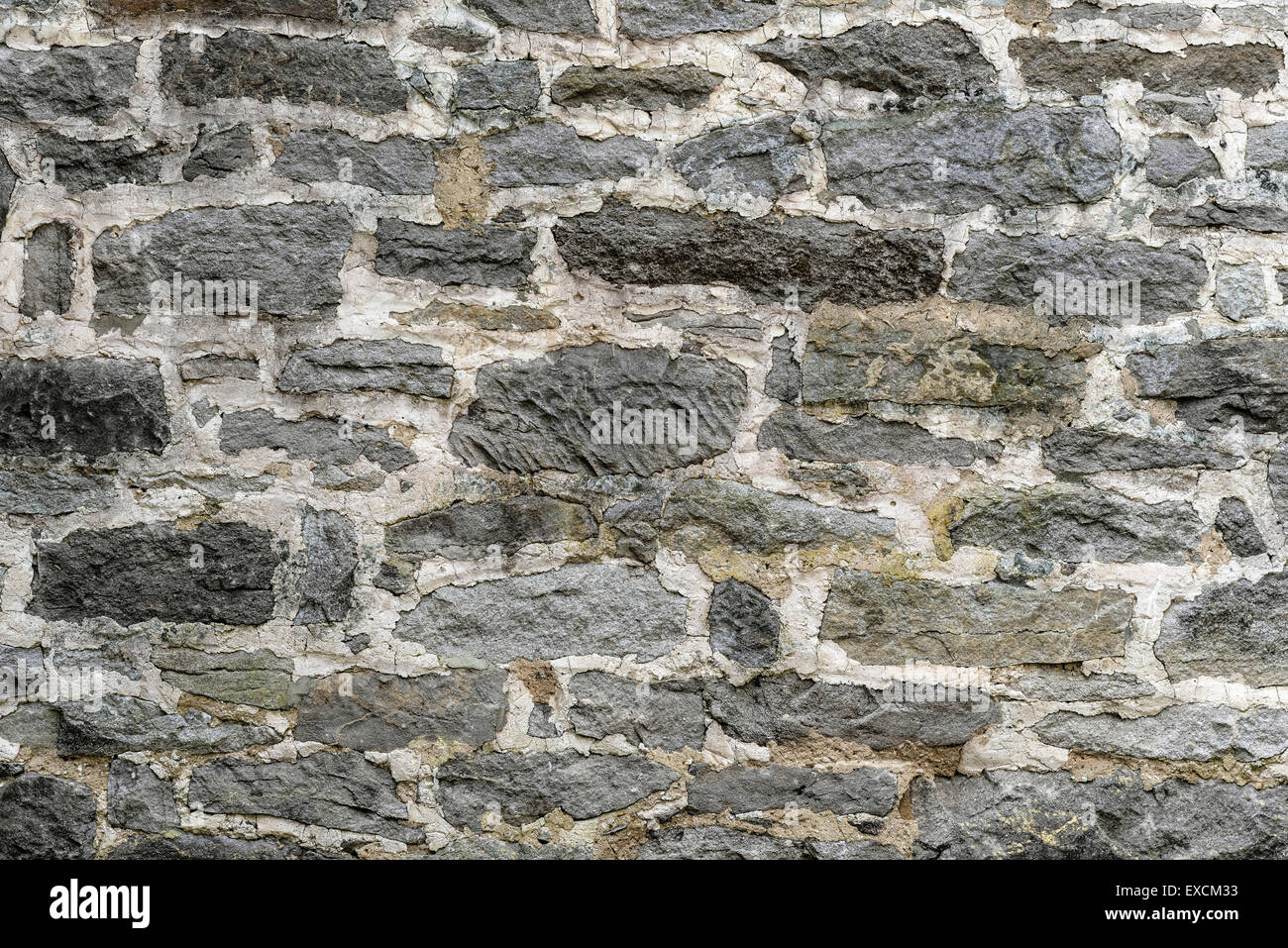 Grigio pietra modellato orizzontale a parete Foto Stock