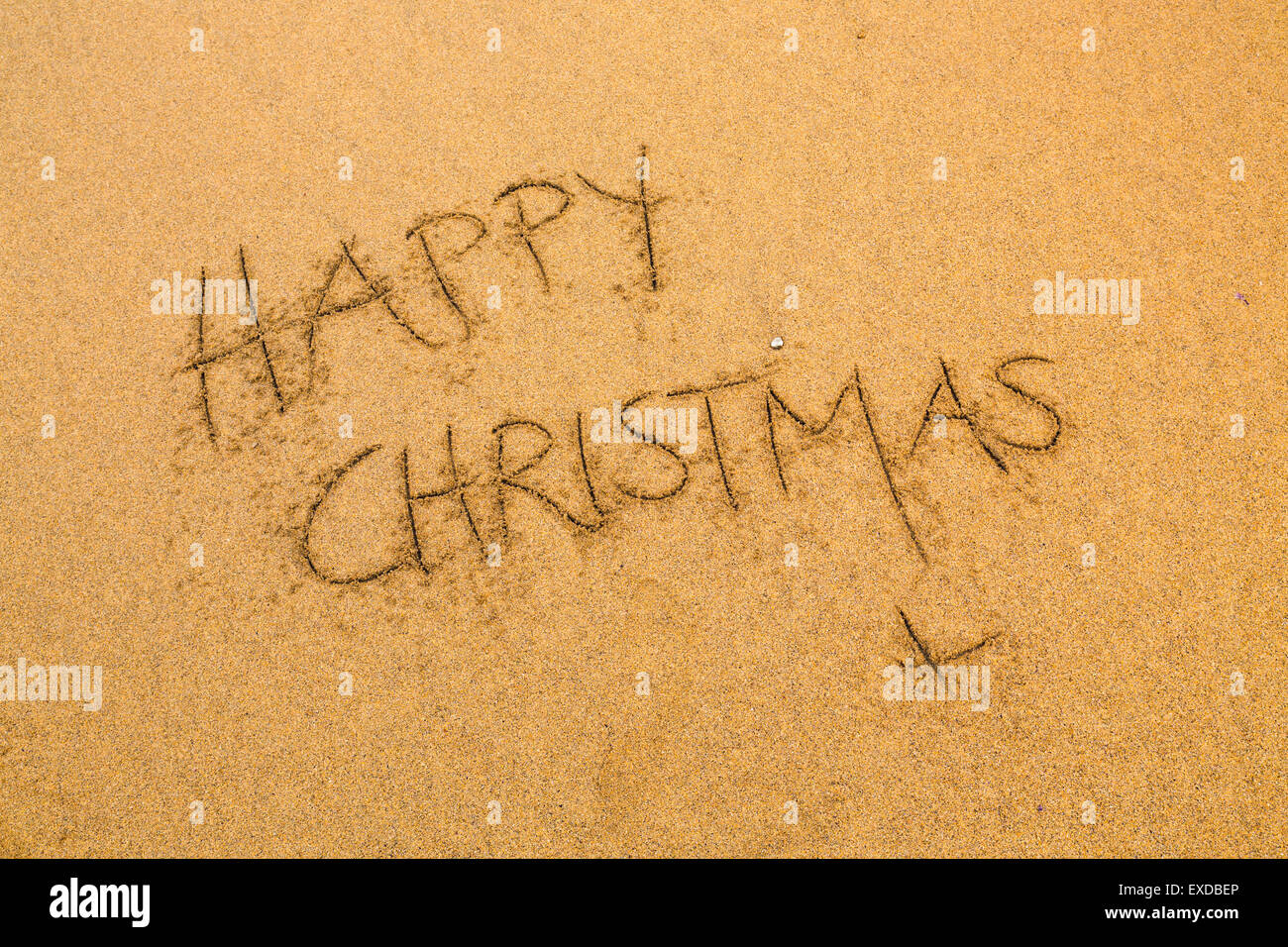 Messaggio nella sabbia; felice Natale; Cornovaglia; Regno Unito Foto Stock