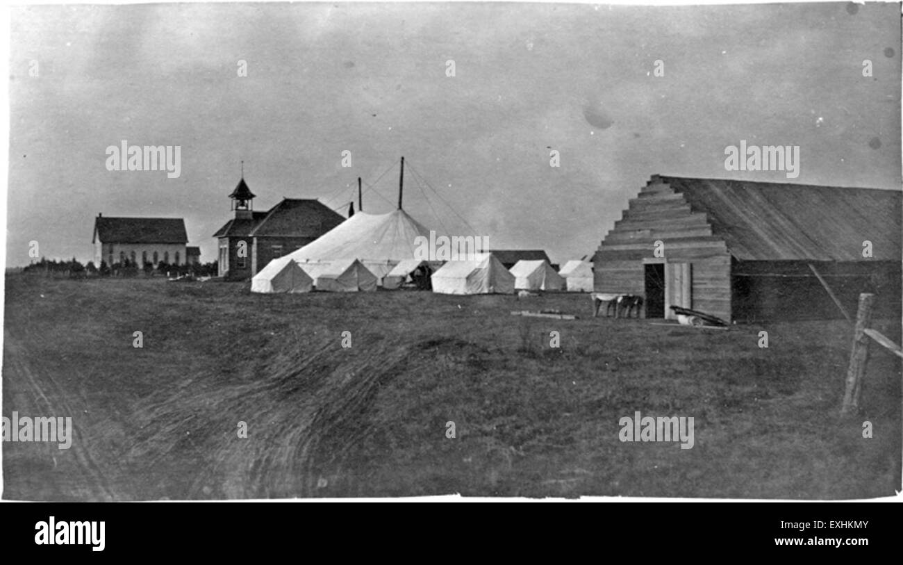 La Conferenza Generale della Chiesa Mennita del 1914 fu un raduno religioso che discusse politiche ecclesiastiche, fede e sfide all'inizio della Prima Guerra Mondiale, riflettendo l'impegno mennonita per la pace e i valori comunitari. Foto Stock