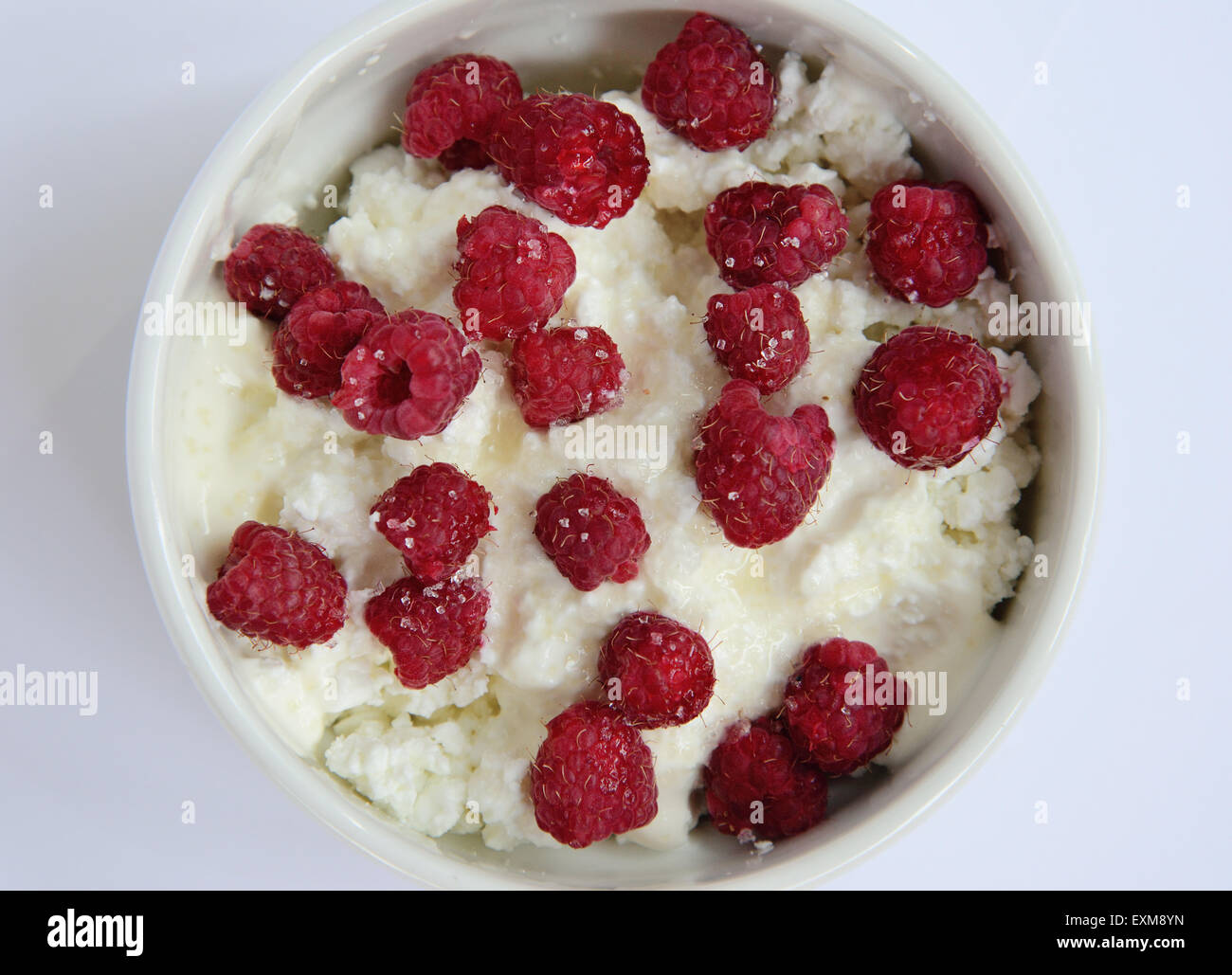 Coppa con crema di formaggio e lamponi Foto Stock