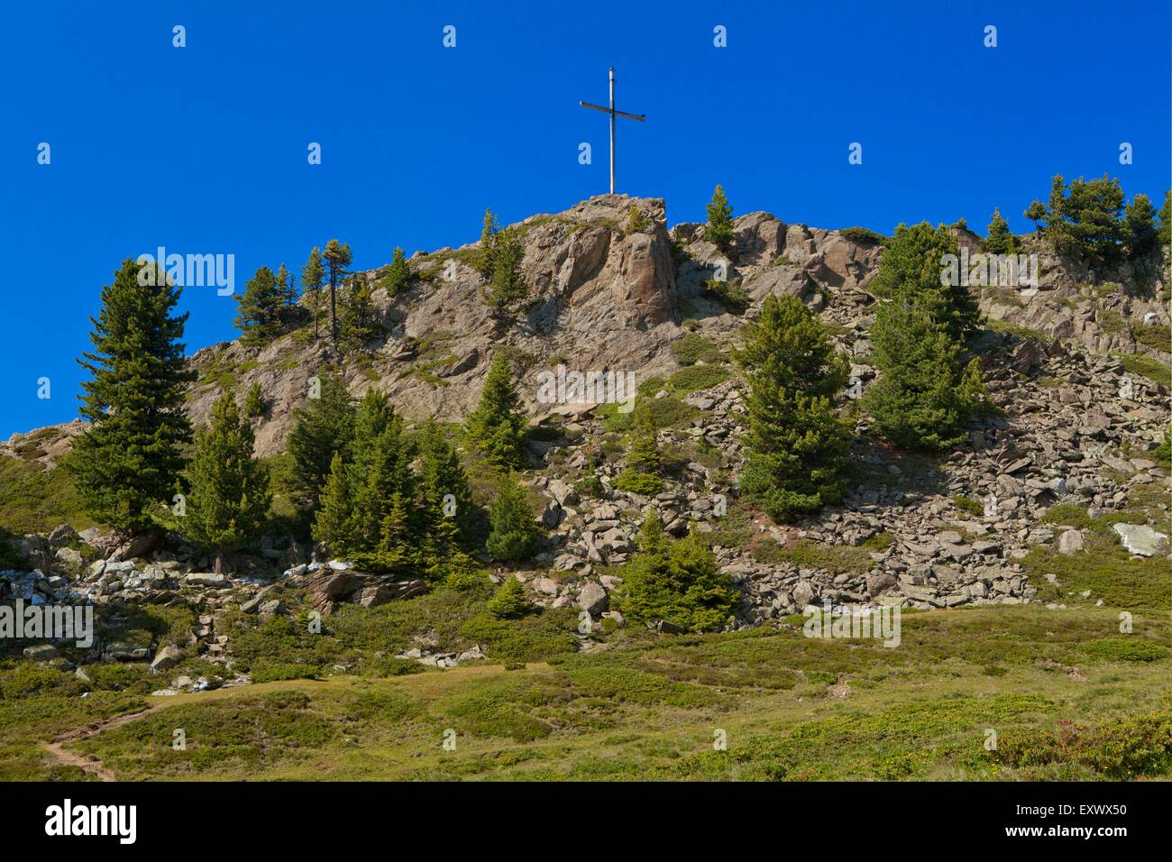 Vertice di croce a Faltegartenkoepfl, Alpi dello Stubai in Tirolo, Austria, Europa Foto Stock