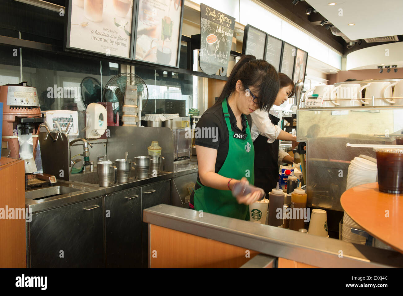 Starbucks barista Hong Kong Cina Foto Stock