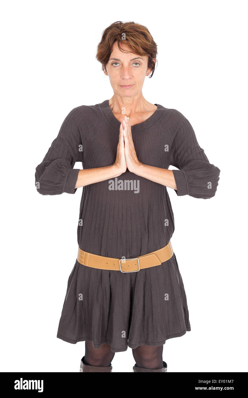 Bella donna facendo espressioni diverse in diversi set di vestiti: pregare Foto Stock