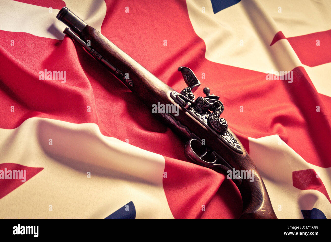 Bandiera del Regno Unito e flintlock gun Foto Stock