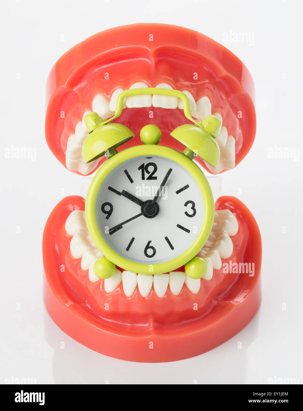 Modello di denti e sveglia Foto Stock