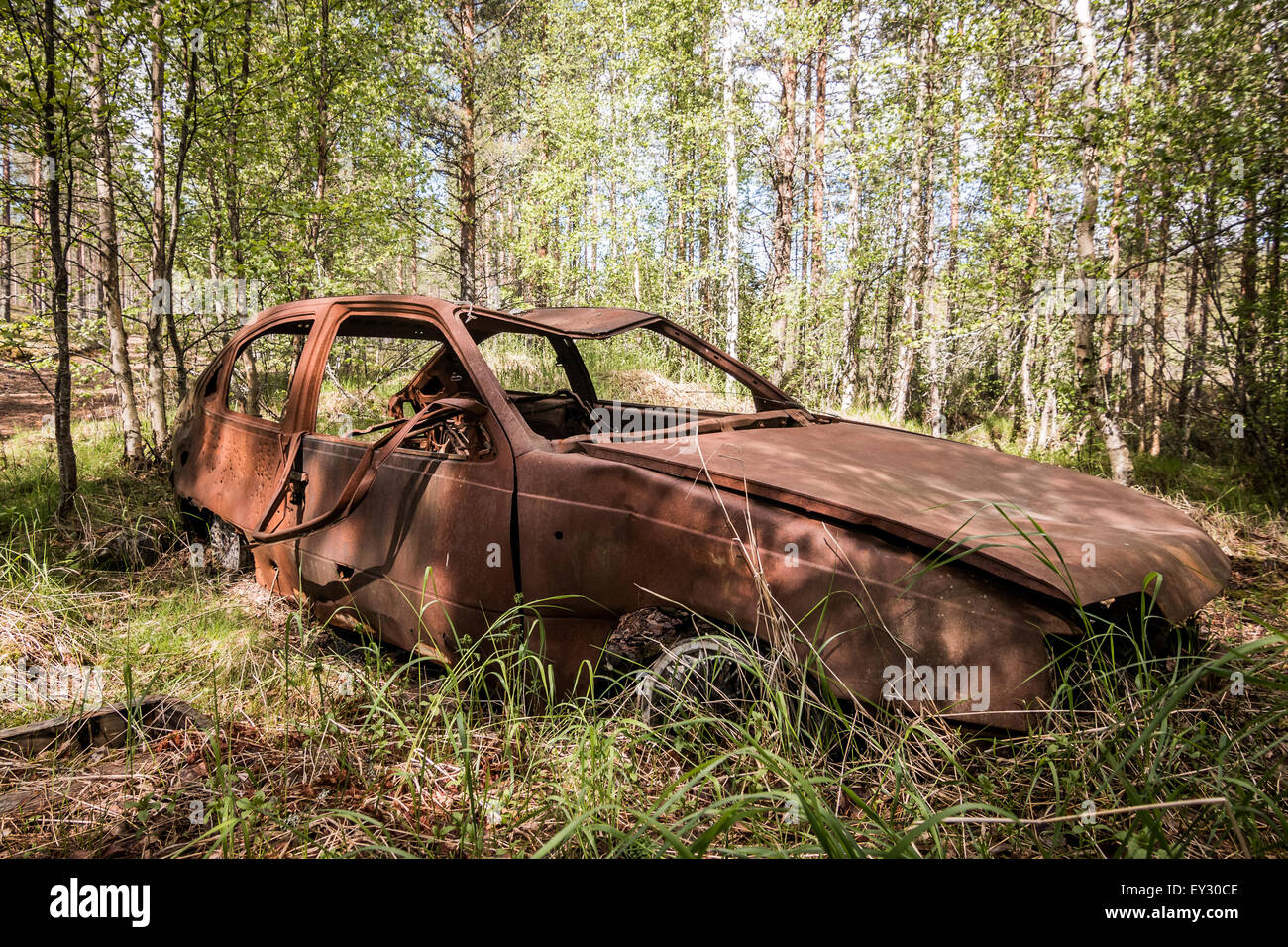 Un auto abbandonate Foto Stock
