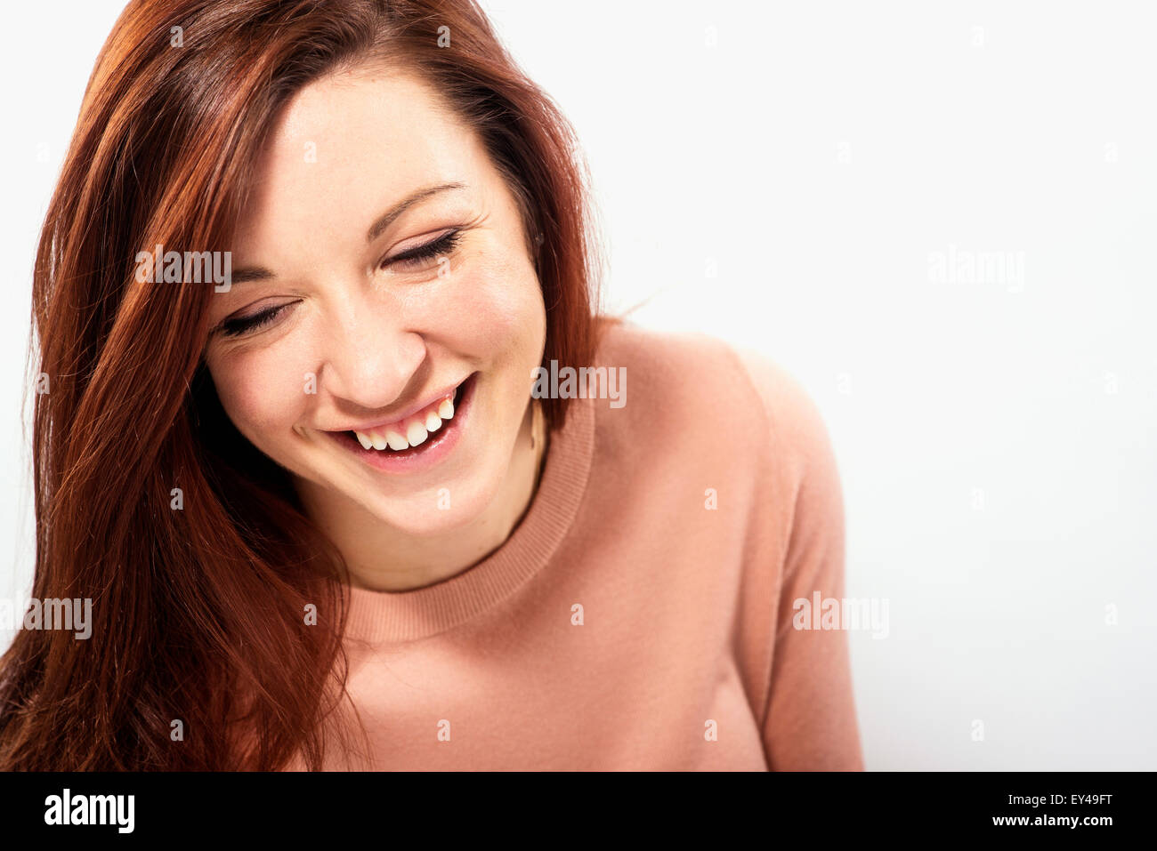 Un ridere donna Foto Stock