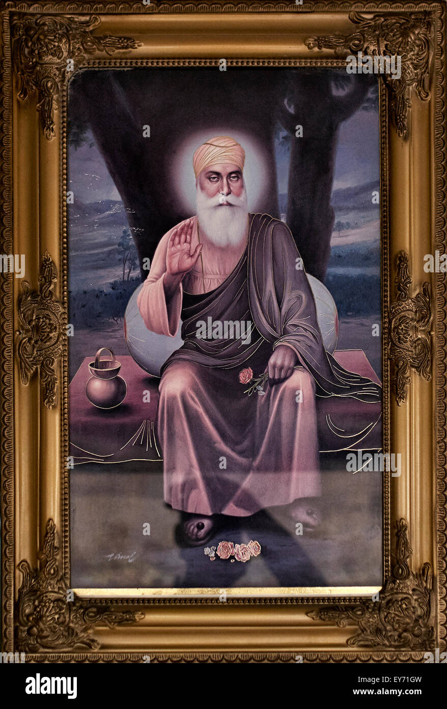La pittura di un riverito Guru sikh Foto Stock