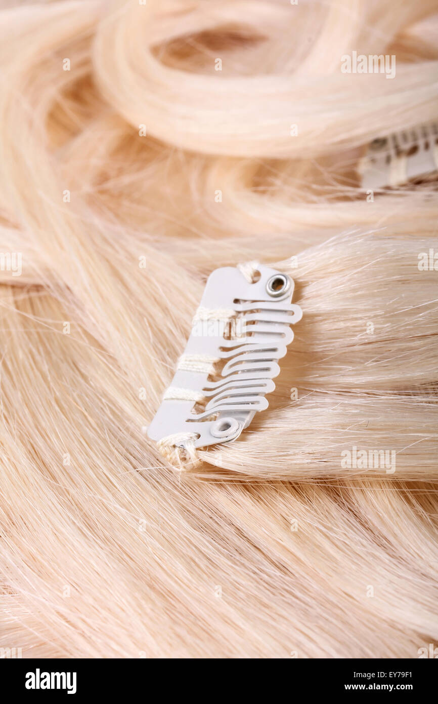 Capelli biondi estensione, dettagli clip Foto Stock