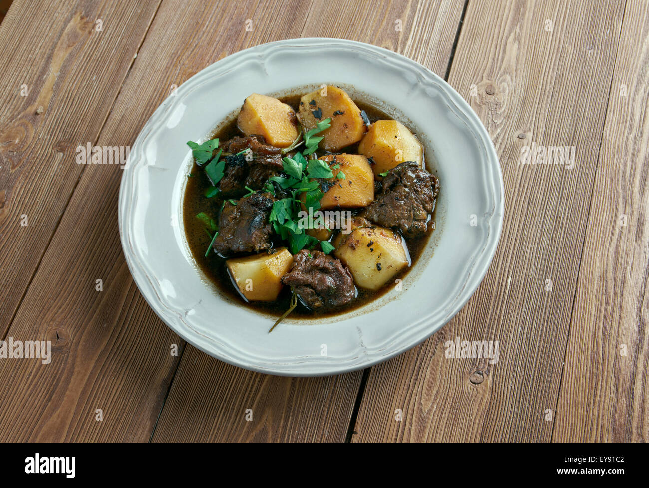 , Aloo gosht - curry di carne nel nord la cucina indiana e pakistana.consiste di patate, aloo cucinato con carne gosht Foto Stock