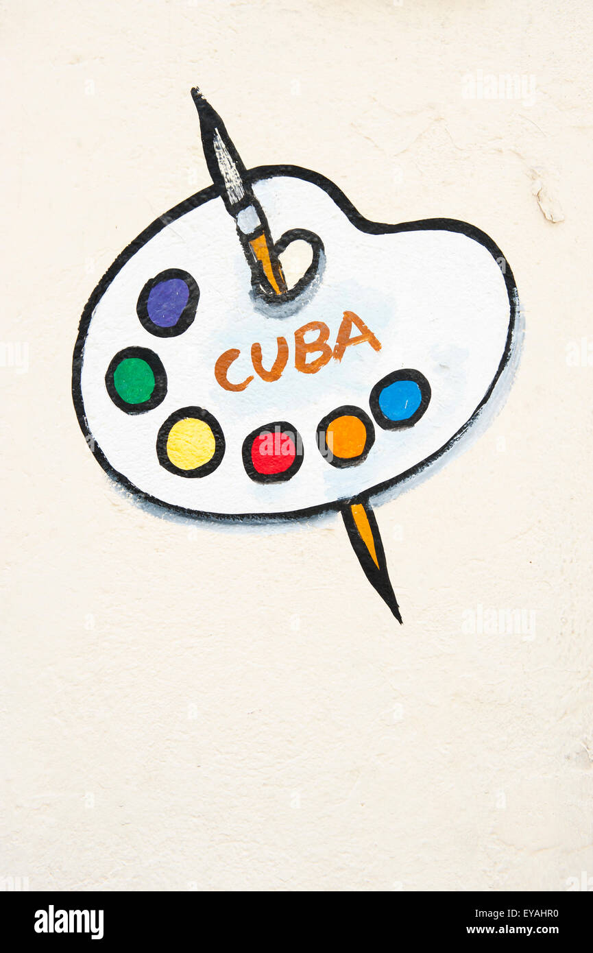 L'Avana, Cuba - Giugno 13, 2011: Cuba segno parete caratteristiche murale pittore della tavolozza con pennello e colori luminosi. Foto Stock