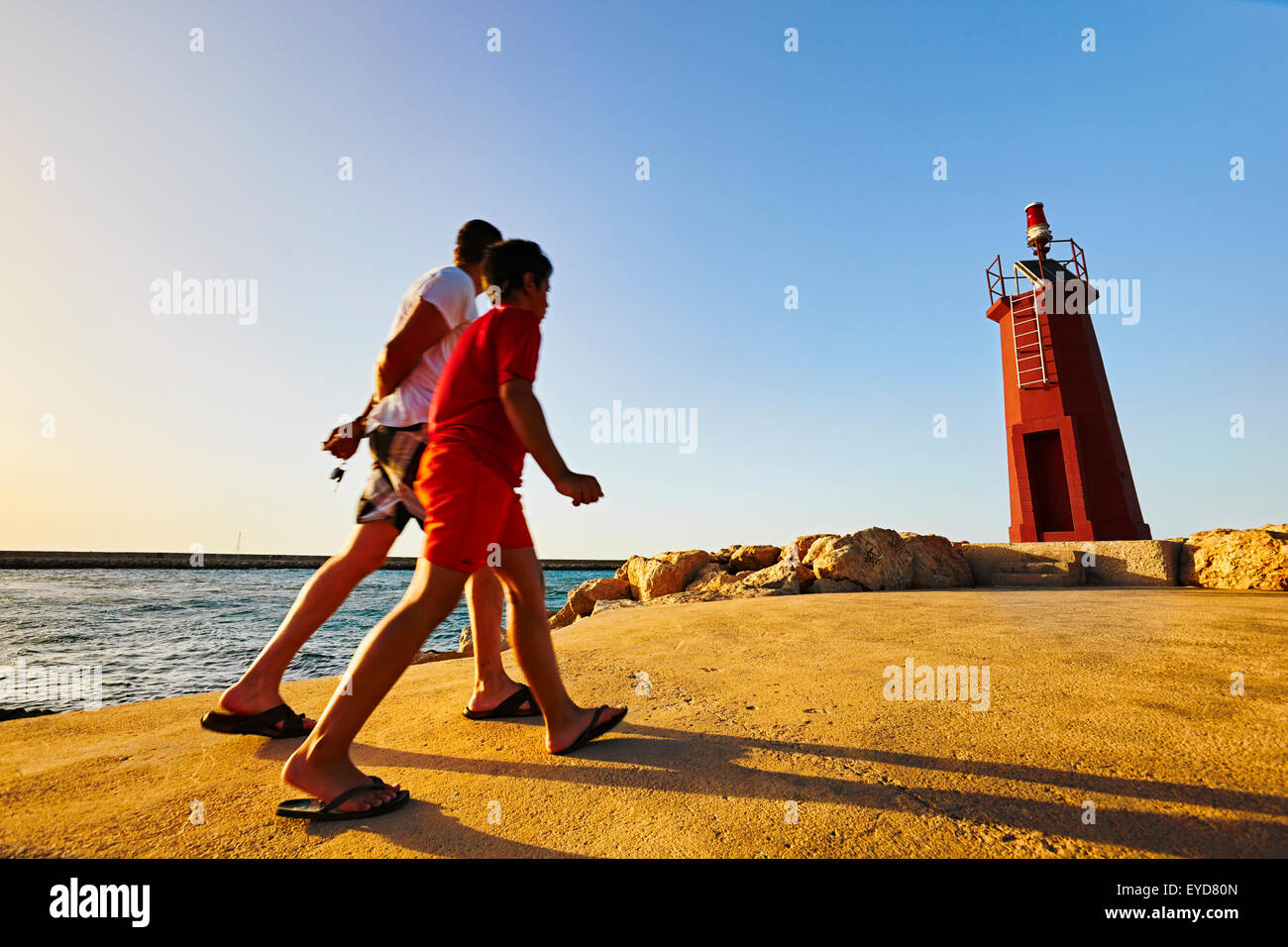 La passeggiata sul lungomare del porto. Denia. Alicante. Comunità di Valencia. Spagna Foto Stock