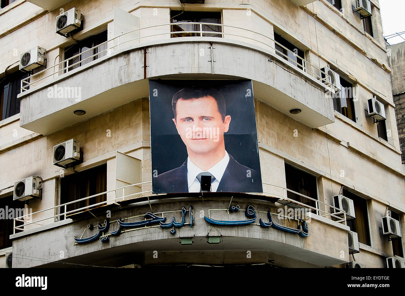Foto del presidente Bashar al-Assad su un edificio nella città capitale prima dello scoppio della guerra civile - Damasco - Siria Foto Stock