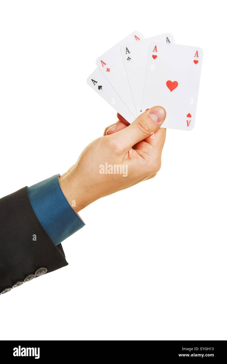 Mano che regge quattro diversi assi giocando a poker Foto Stock