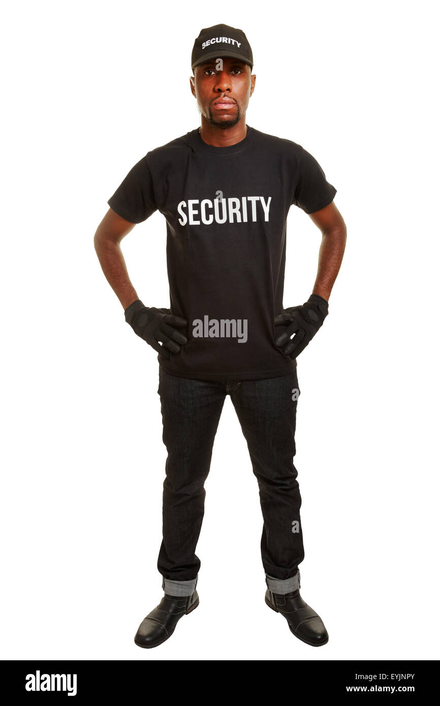 La guardia di sicurezza dalla ditta di sicurezza in piedi con le braccia akimbo Foto Stock