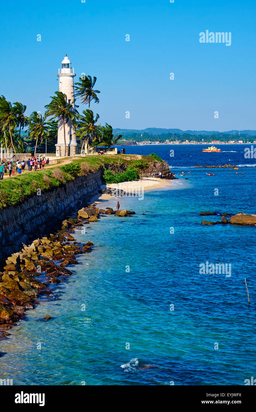Sri Lanka, della Provincia Meridionale, South Coast Beach, Galle, città vecchia, Fort olandese, sito Patrimonio Mondiale dell'UNESCO, Faro e corazza Foto Stock