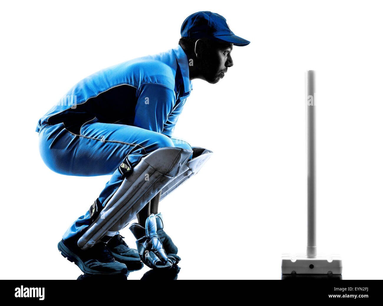 Giocatore di Cricket in silhouette ombra su sfondo bianco Foto Stock