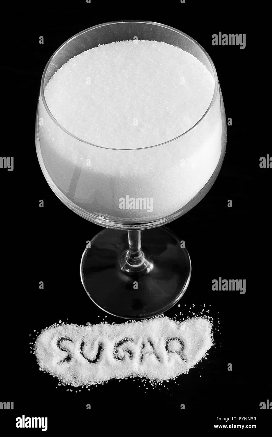 Una tazza di zucchero e il suo costo Foto Stock