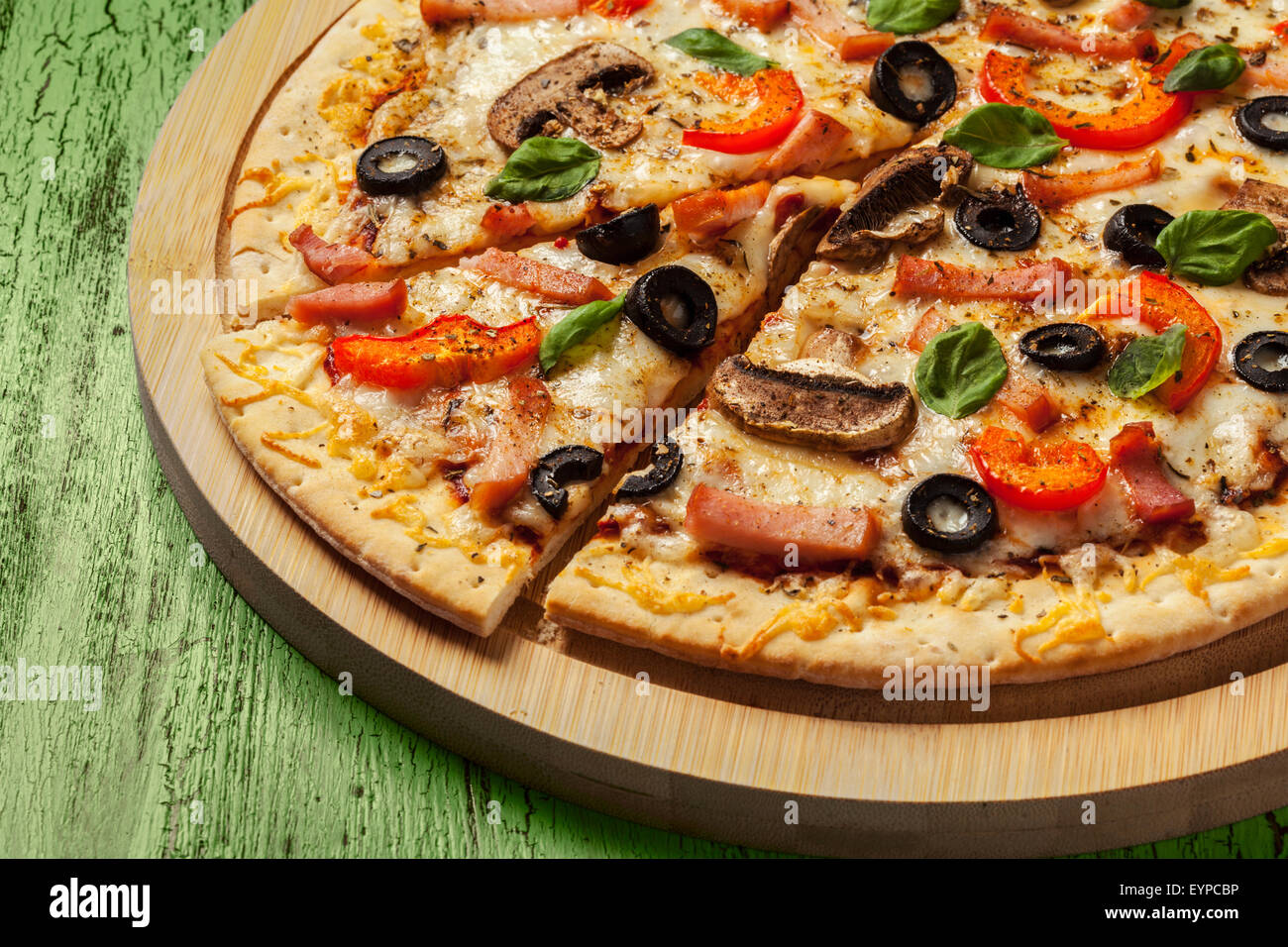 Pizza al prosciutto Foto Stock