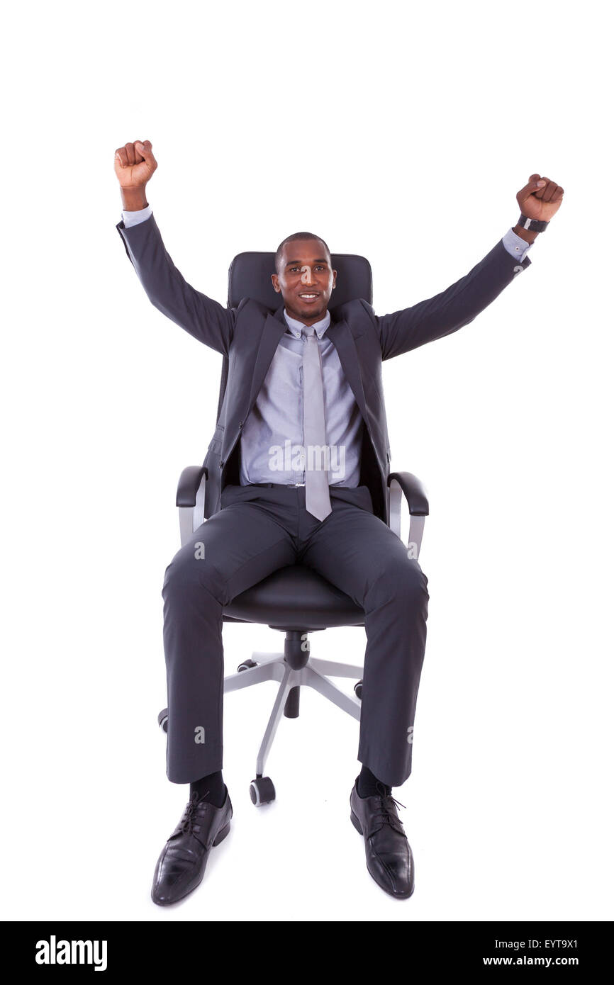 African American business man con il pugno chiuso su sfondo bianco - nero di persone Foto Stock