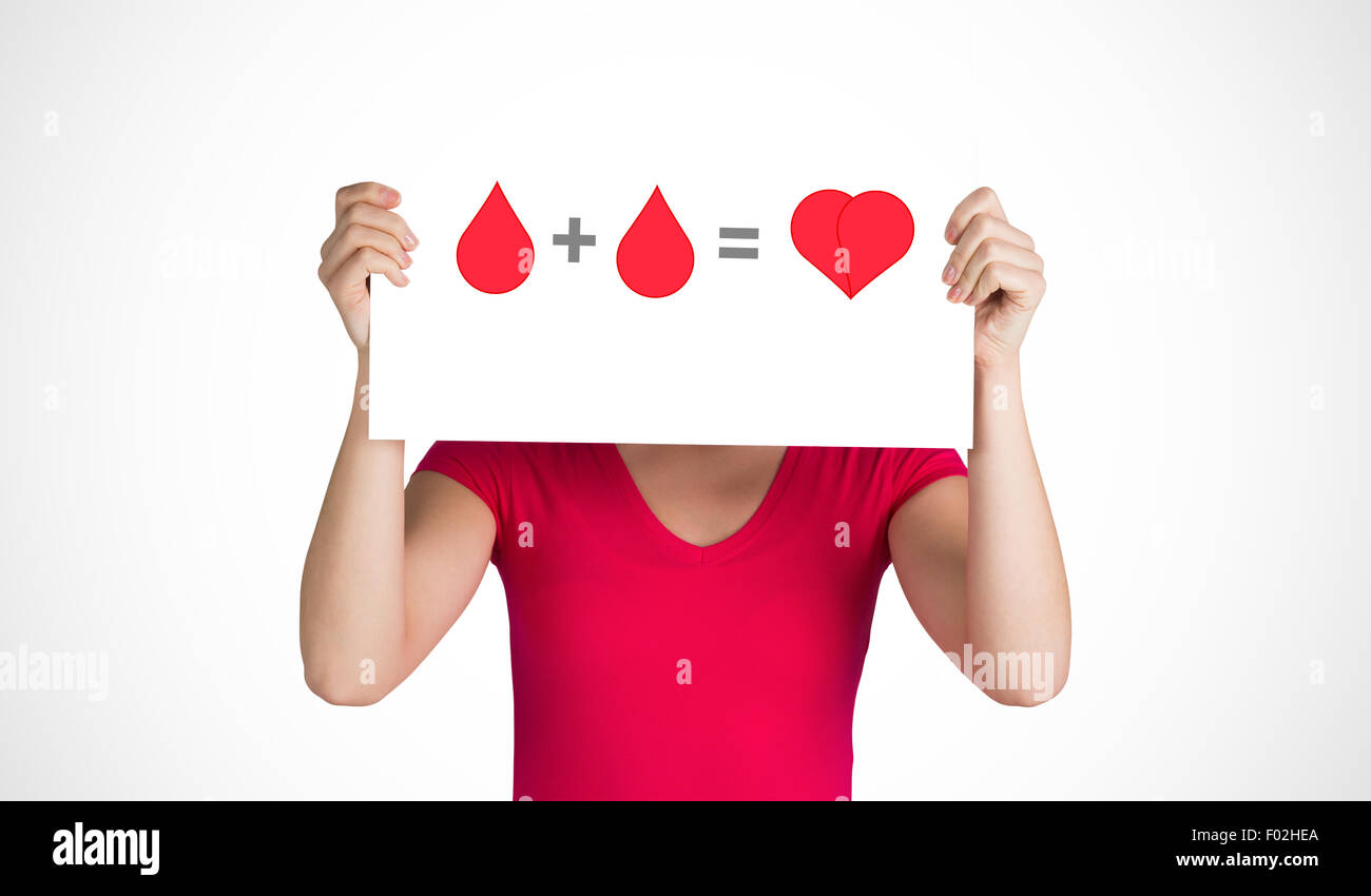 Una donazione di sangue segno essendo mantenuto fino Foto Stock