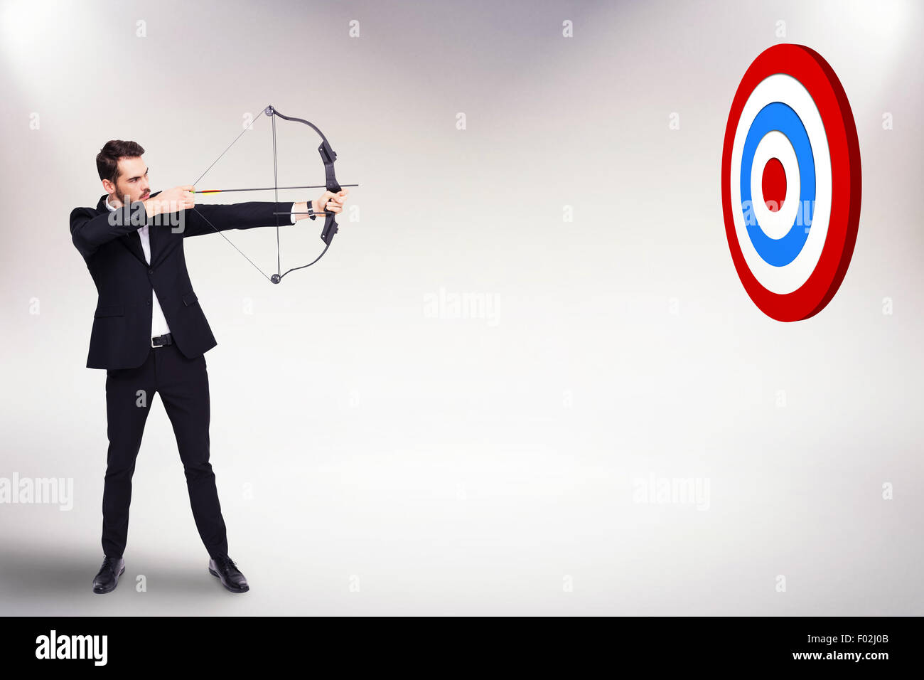 Immagine composita di imprenditore la ripresa di un arco e frecce Foto Stock