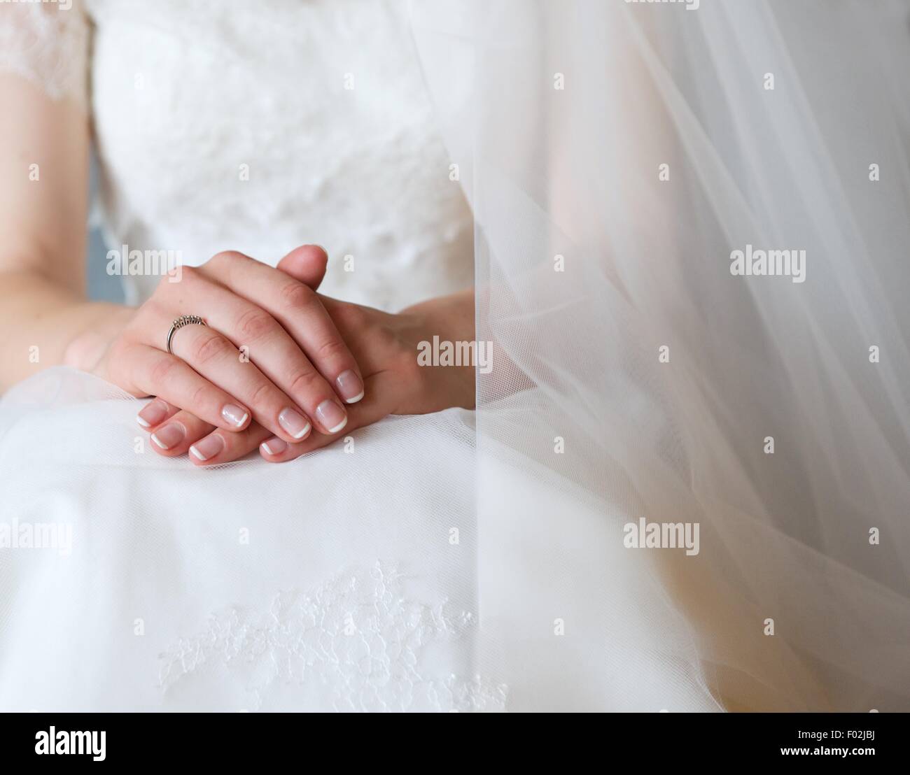 Close-up di una sposa le mani Foto Stock
