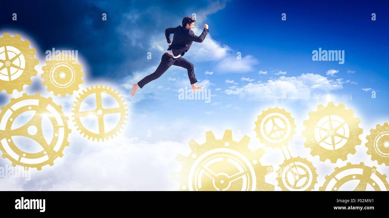 Immagine composita di imprenditore che saltava Foto Stock