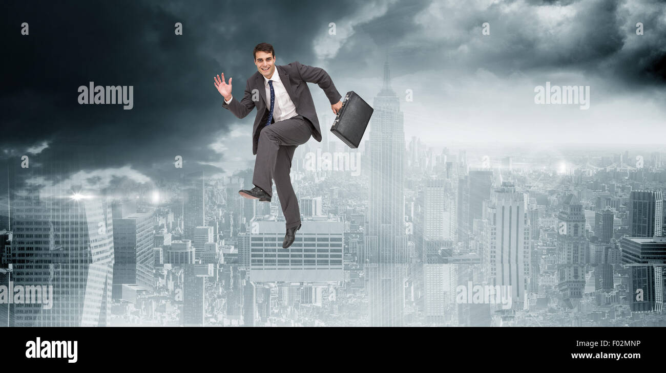 Immagine composita di happy businessman in fretta Foto Stock