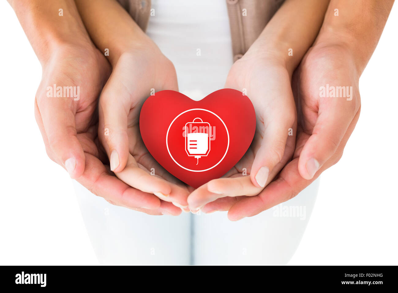 Immagine composita della giovane azienda cuore in miniatura in mani Foto Stock