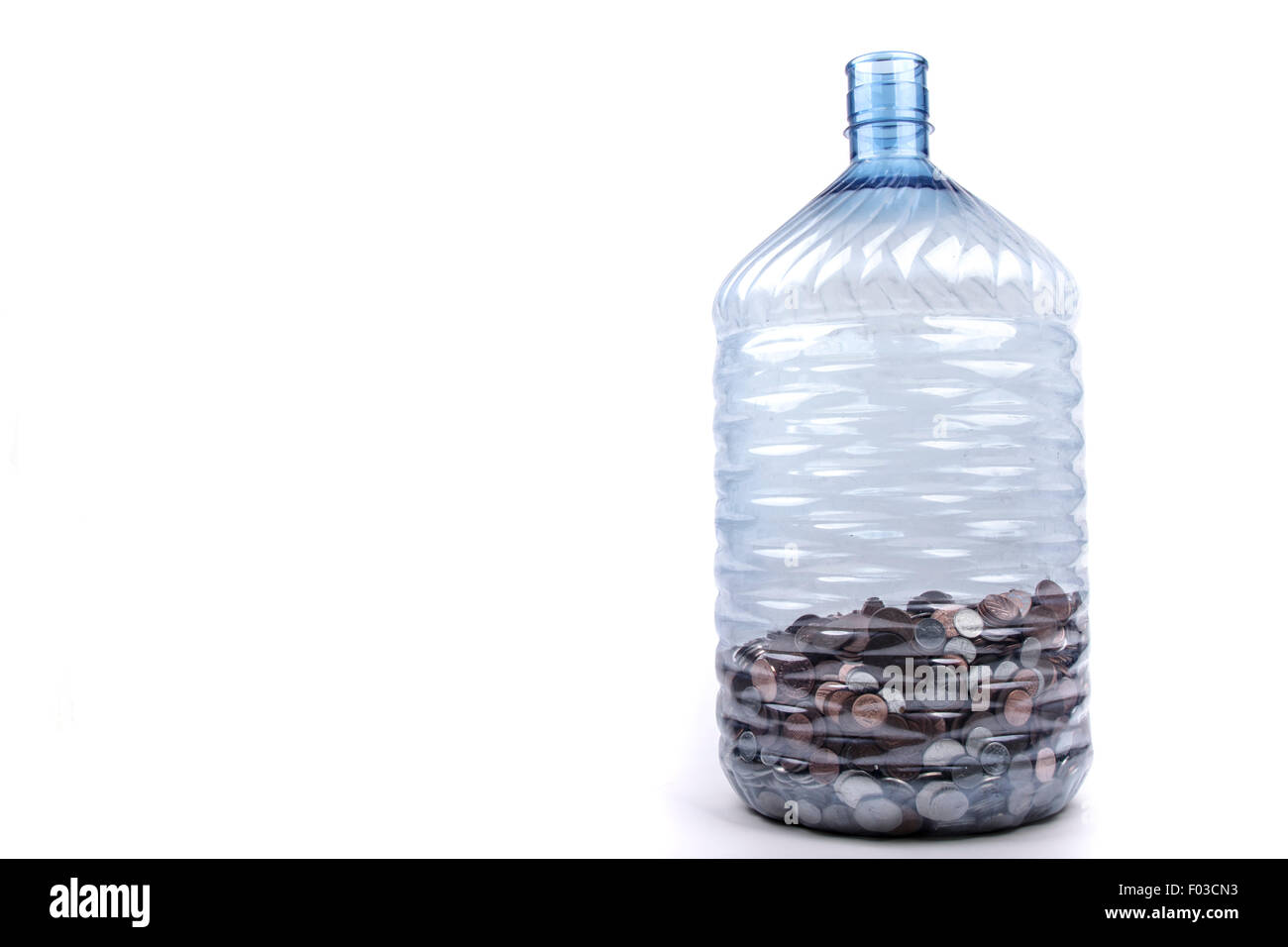 Modificare in una bottiglia di plastica Foto Stock