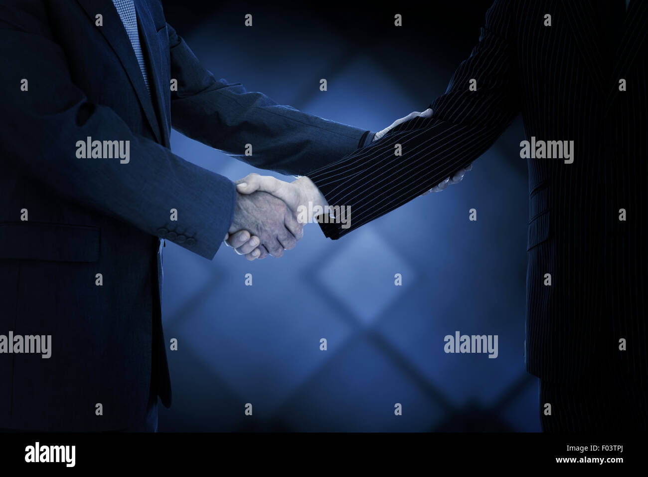 Immagine composita di handshake in accordo Foto Stock
