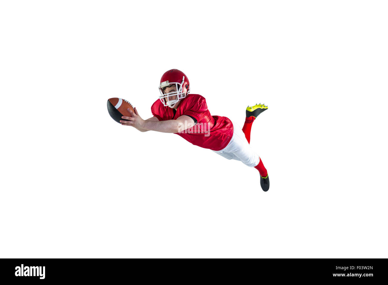 Giocatore di football americano segnando un touchdown Foto Stock