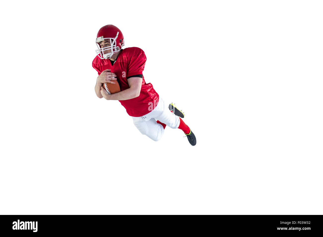 Giocatore di football americano segnando un touchdown Foto Stock