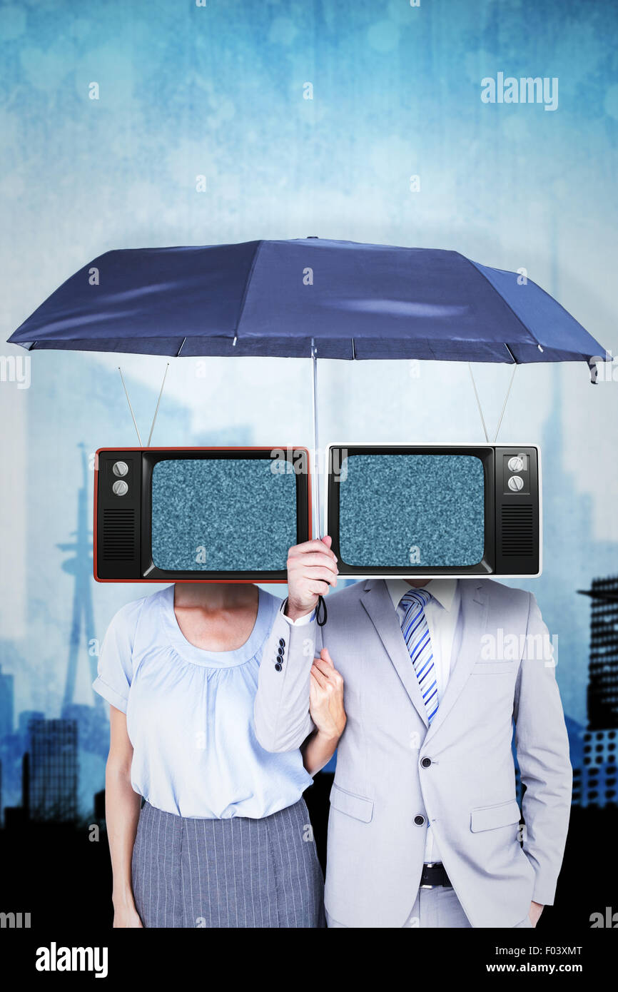 Immagine composita della gente di affari tenendo un ombrello nero Foto Stock