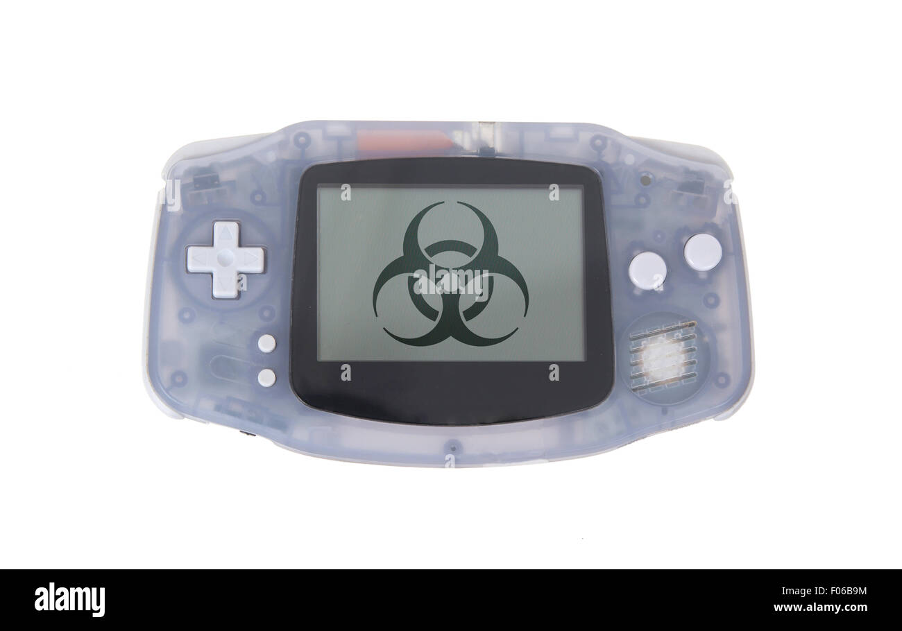 Old Dirty console di gioco portatili con un piccolo schermo - simbolo di rischio biologico Foto Stock