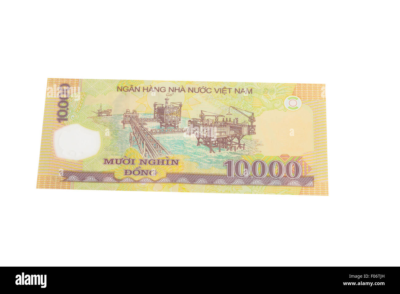 Dieci mila Dong vietnamita banconota su sfondo bianco Foto Stock