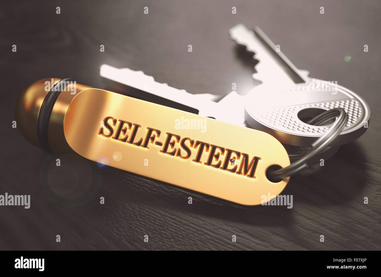 Self-Esteem - mazzo di chiavi con il testo su Golden portachiavi. Foto Stock