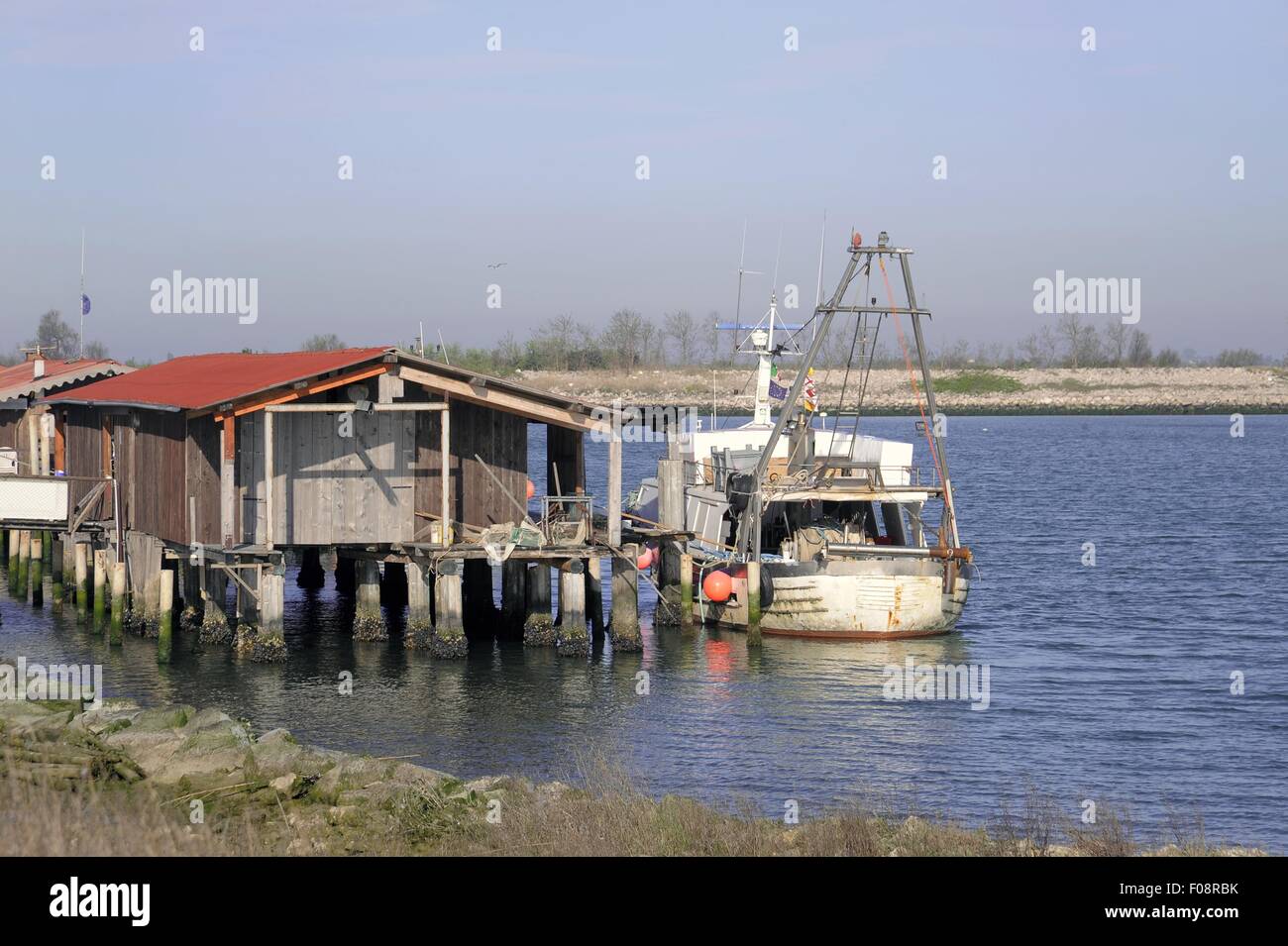 Pila, presso il comune di Porto Tolle, delta del fiume Po in provincia di Rovigo (Italia), il porto di pesca Foto Stock