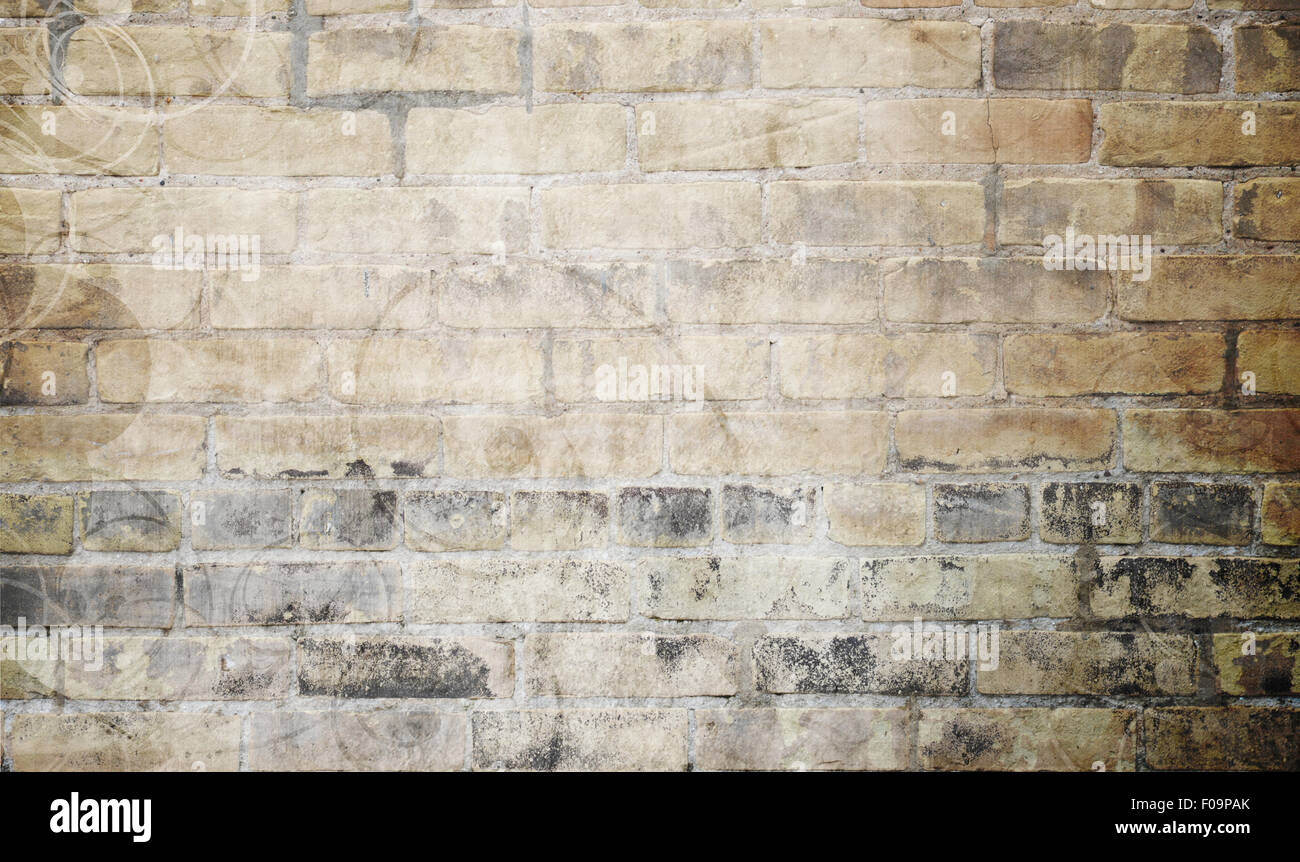 Grunge Sfondo mattone con volute e marrone e grigio weathered muro di mattoni. Foto Stock