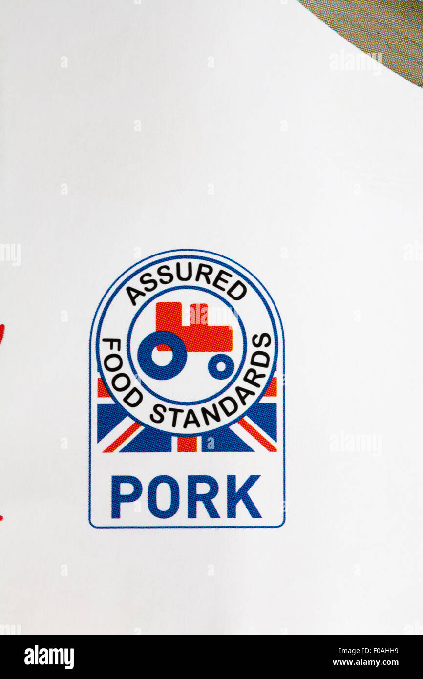 La carne di maiale garantita per le norme alimentari con logo piccolo trattore rosso Foto Stock