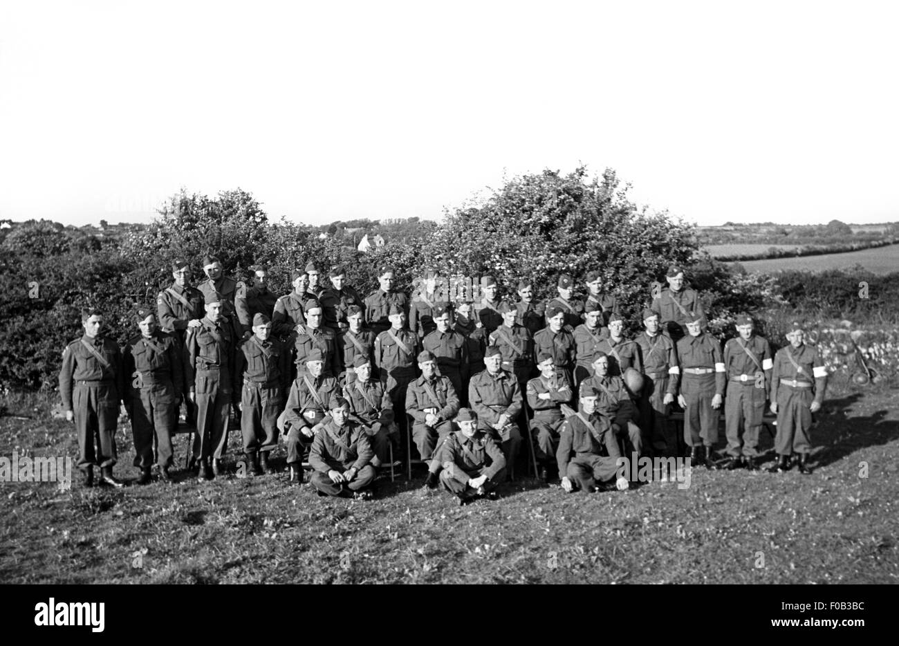 La casa della guardia in tempo di guerra la Gran Bretagna che posano per una foto di gruppo. Foto Stock