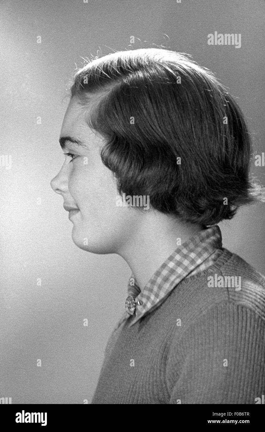 Profilo di una giovane donna Foto Stock